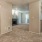 Open space living area open to other areas of the apartment