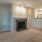 Open space living area with a fireplace